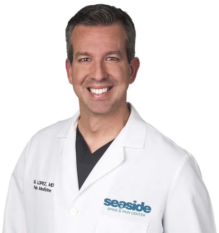 Dr. Manuel López, MD, board-certified pain management physician at Seaside Spine and Pain Center in Palm Coast, Florida